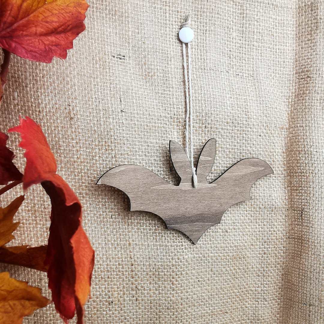 Lapichauves-souris - Suspension en bois foncé